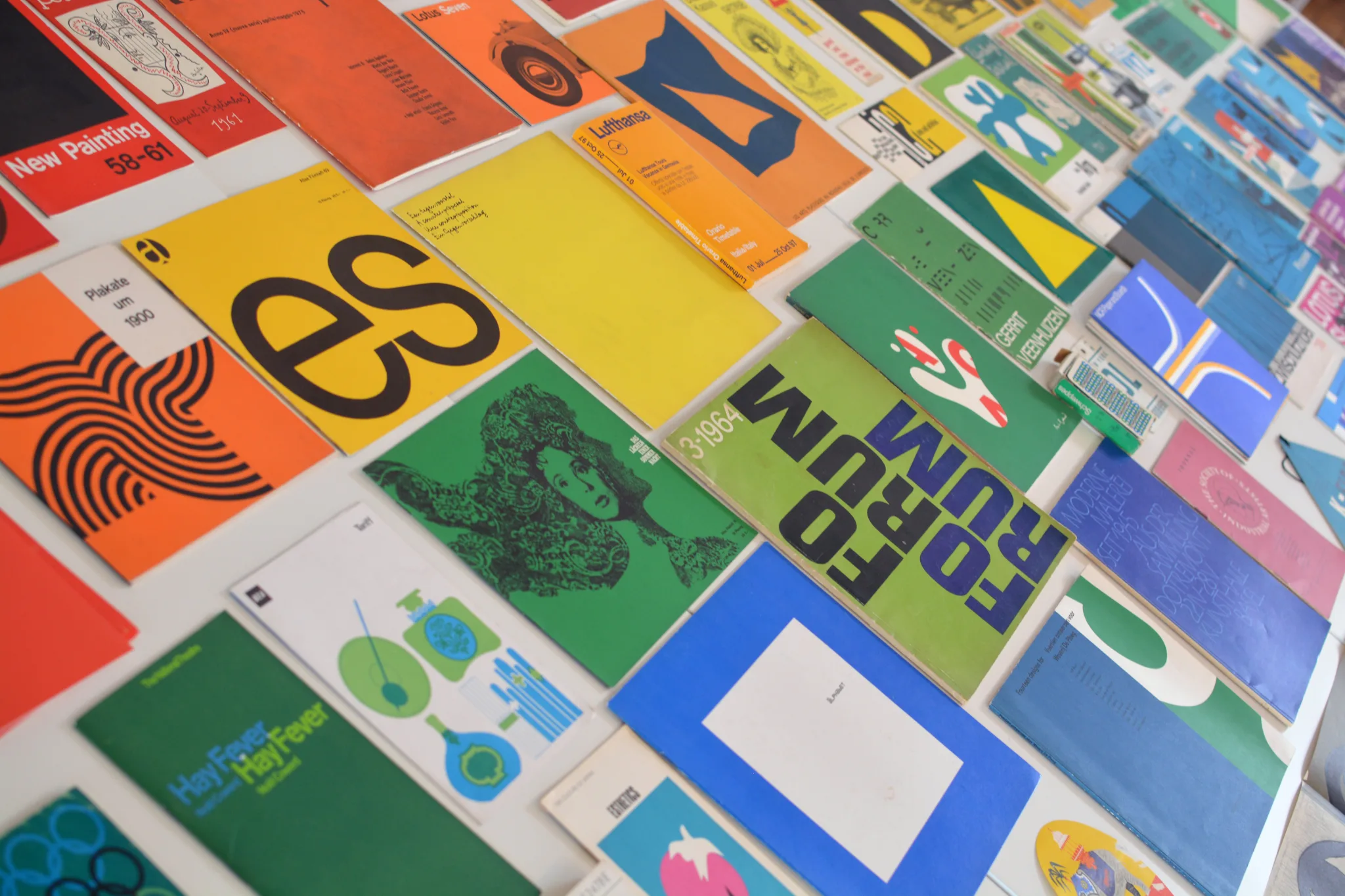 Colourful vintage magazines arranged neatly